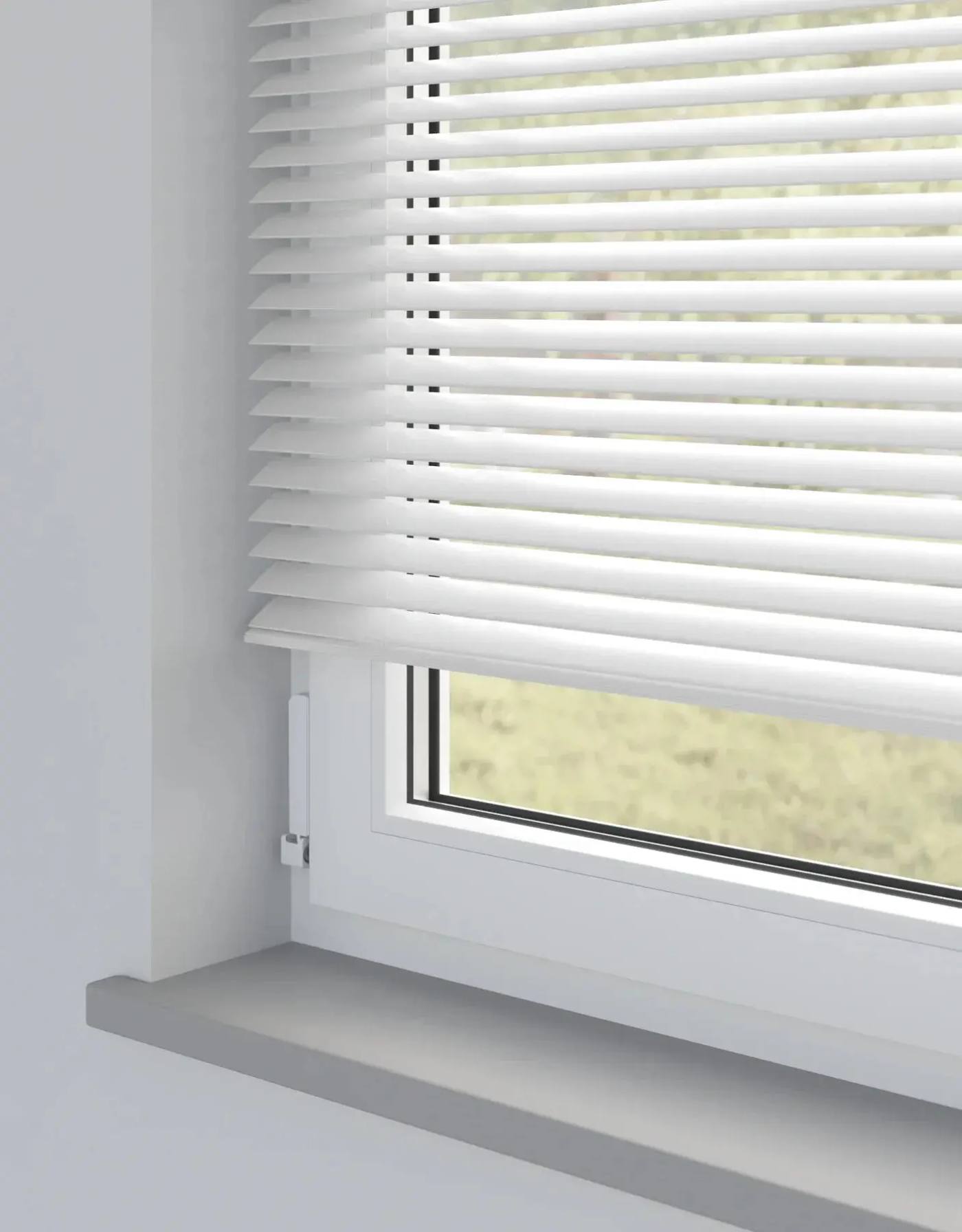 Wooden blinds fitted at a window