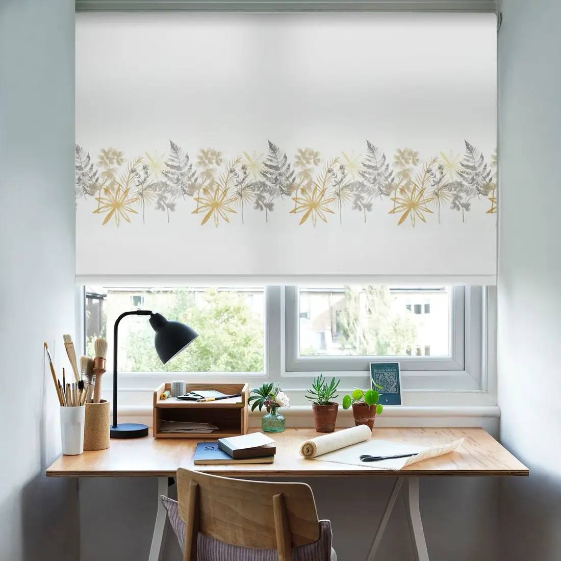 pencil pleat curtains fitted at a window