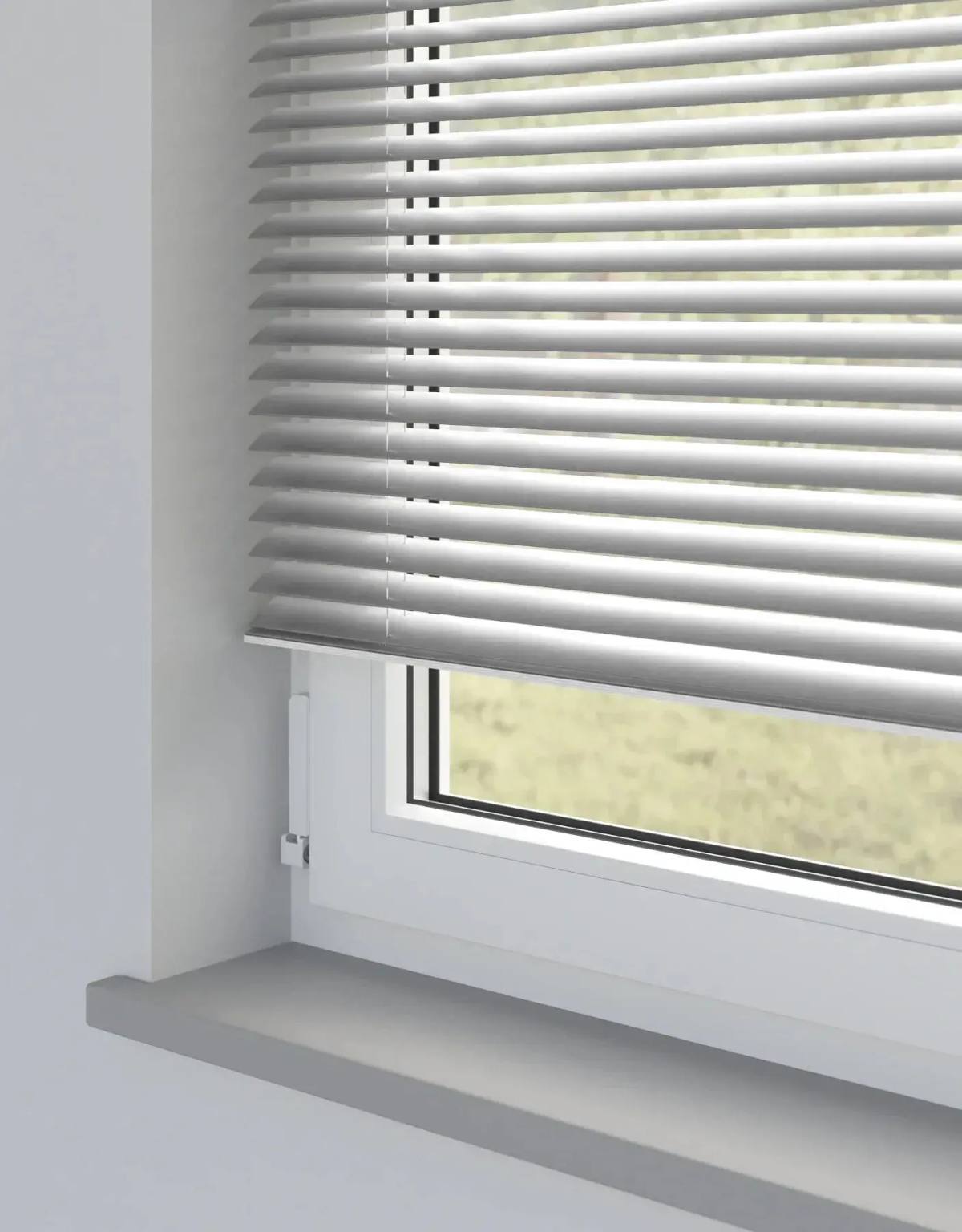 Shiny Silver Metal Venetian Venetian Blinds fitted in a British home